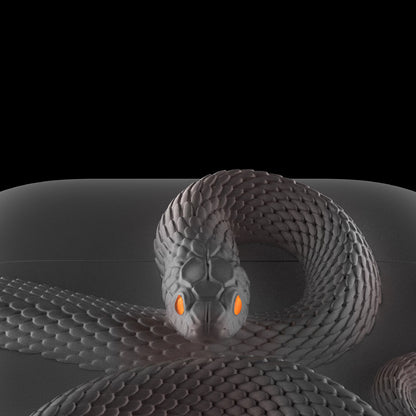 3Dスネークが巻き付いたAirPodsケース