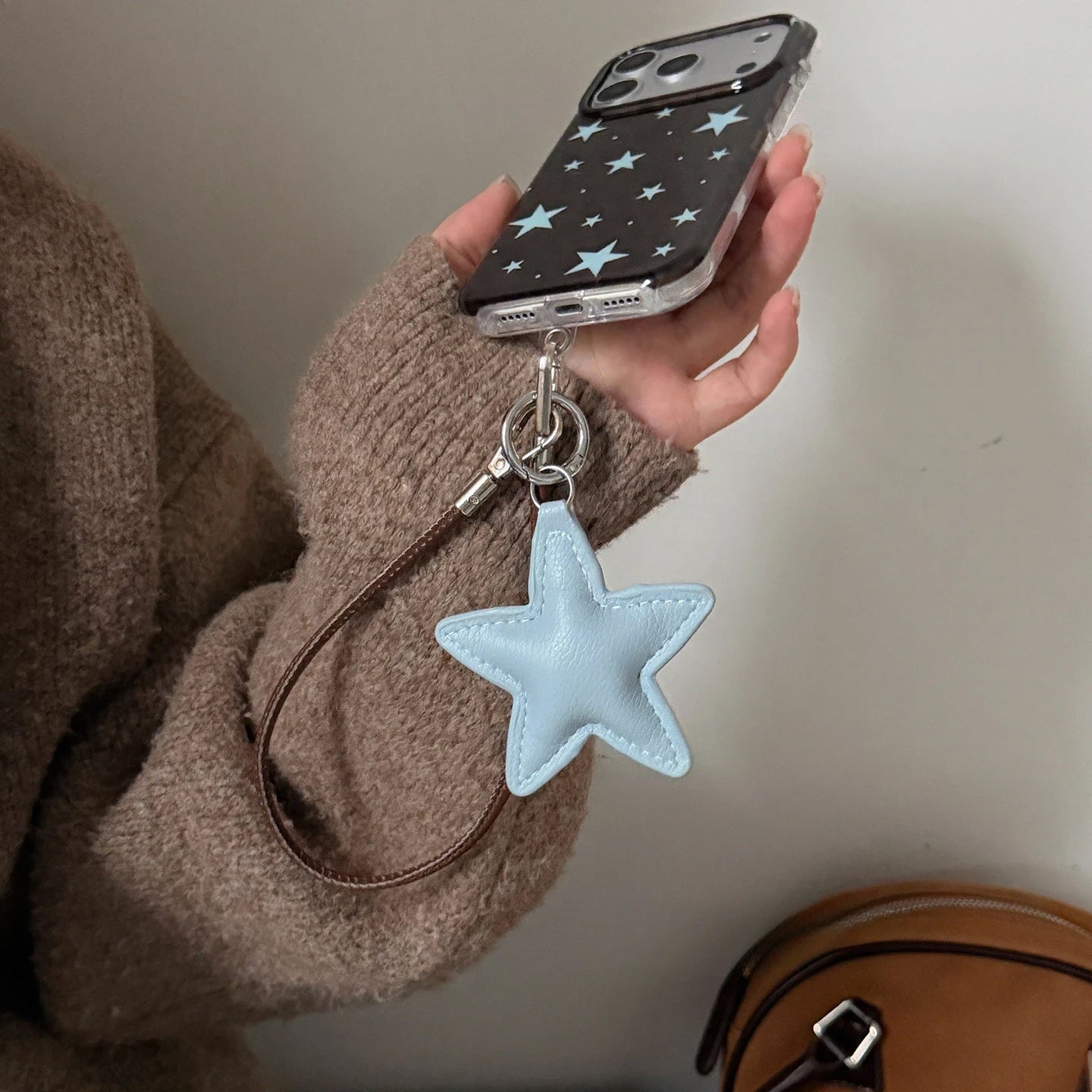 Dark Brown Leopard Print iPhone Case with Blue Star Accents, Reflective Tin Foil Texture